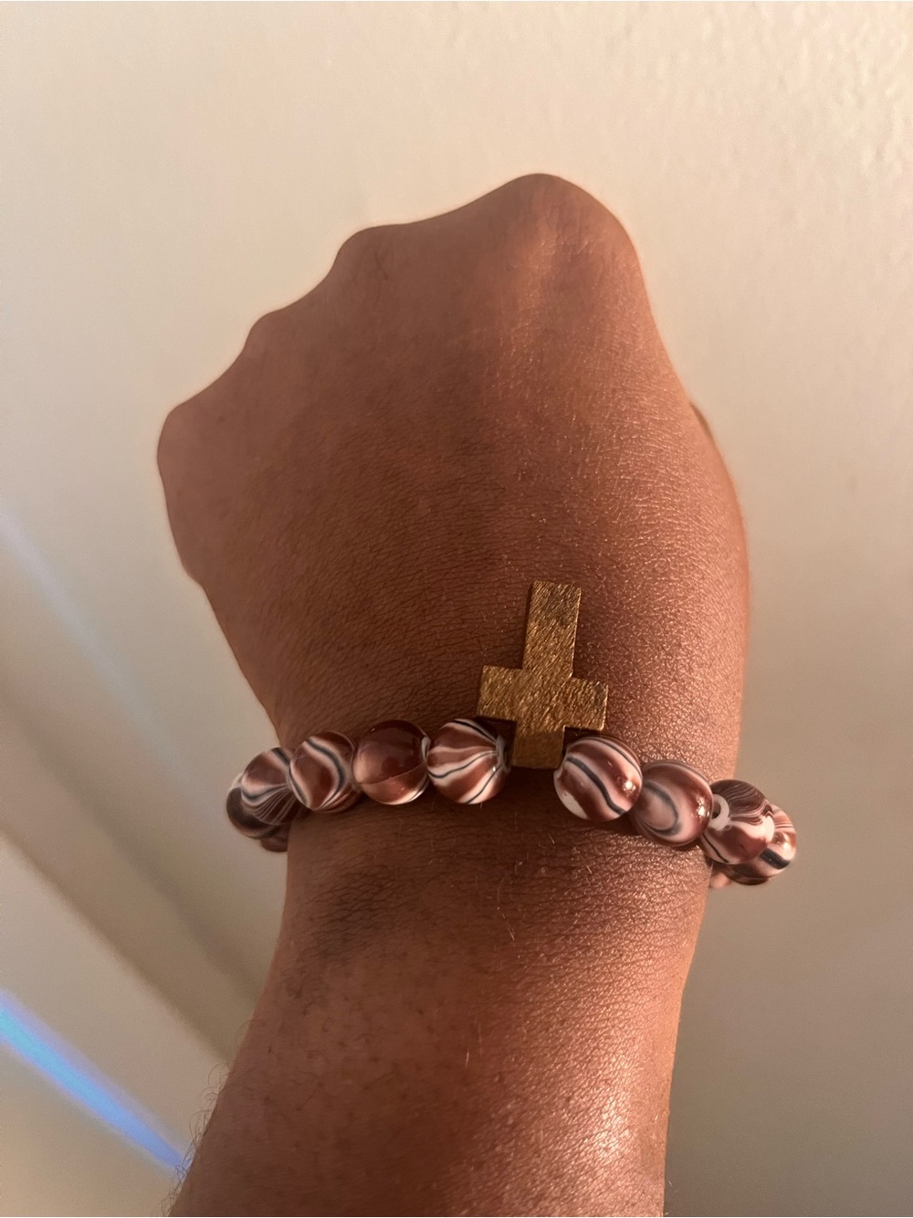 Gold Cross Bracelet with Brown Swirl Beads